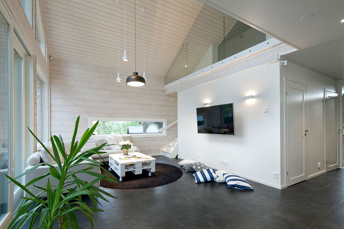 ollikaisen hirsirakenne, puurakenteinen välipohja mahdollistaa talomalli kalevan olohuone oleskelutilan modernin minimalistisen ilmeen